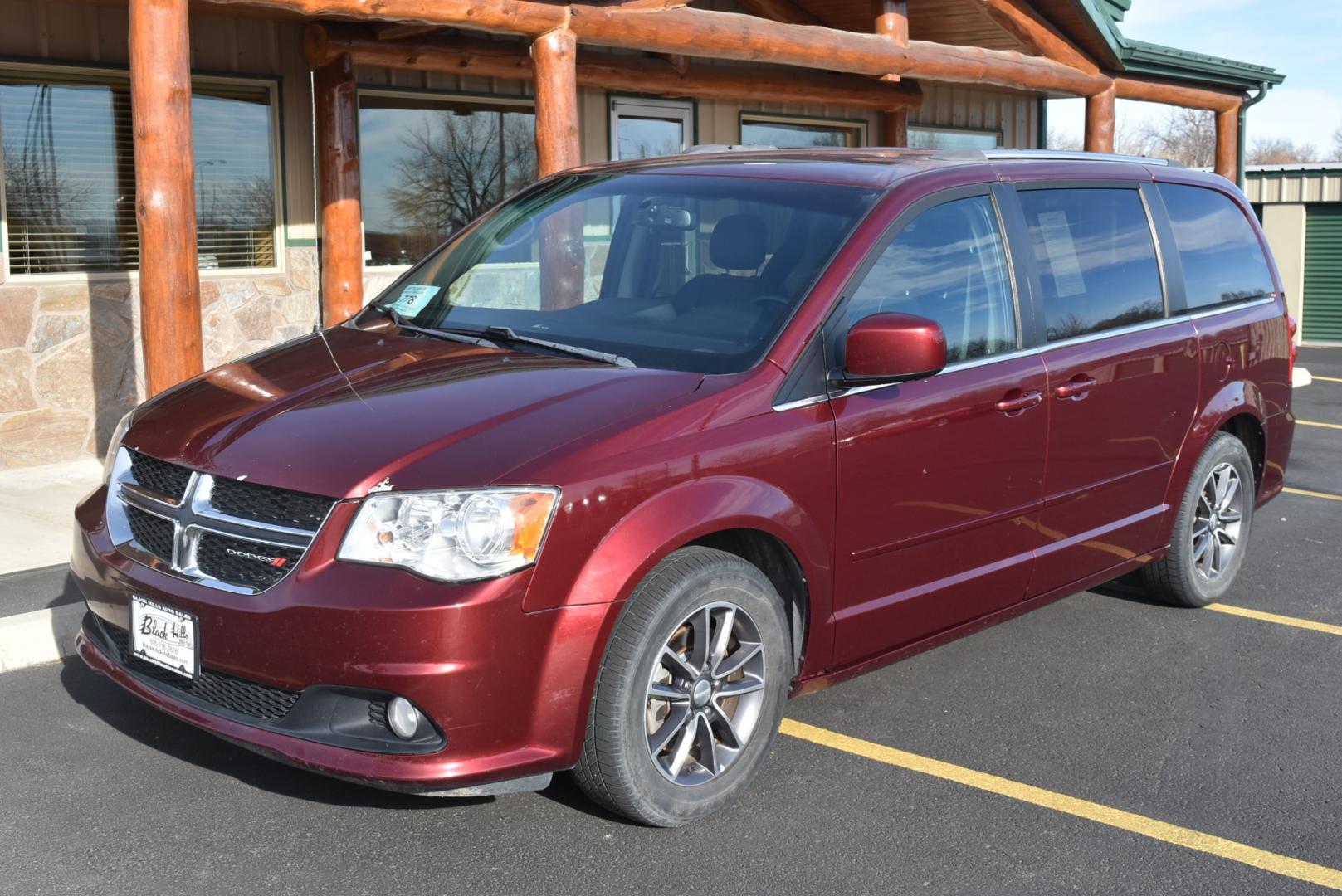 2017 Maroon /Black Dodge Grand Caravan SXT (2C4RDGCGXHR) with an 3.6L V-6 VVT 24 Valve Flex Fuel engine, 6-Speed Automatic transmission, located at 1600 E Hwy 44, Rapid City, SD, 57703, (605) 716-7878, 44.070232, -103.171410 - Photo#2